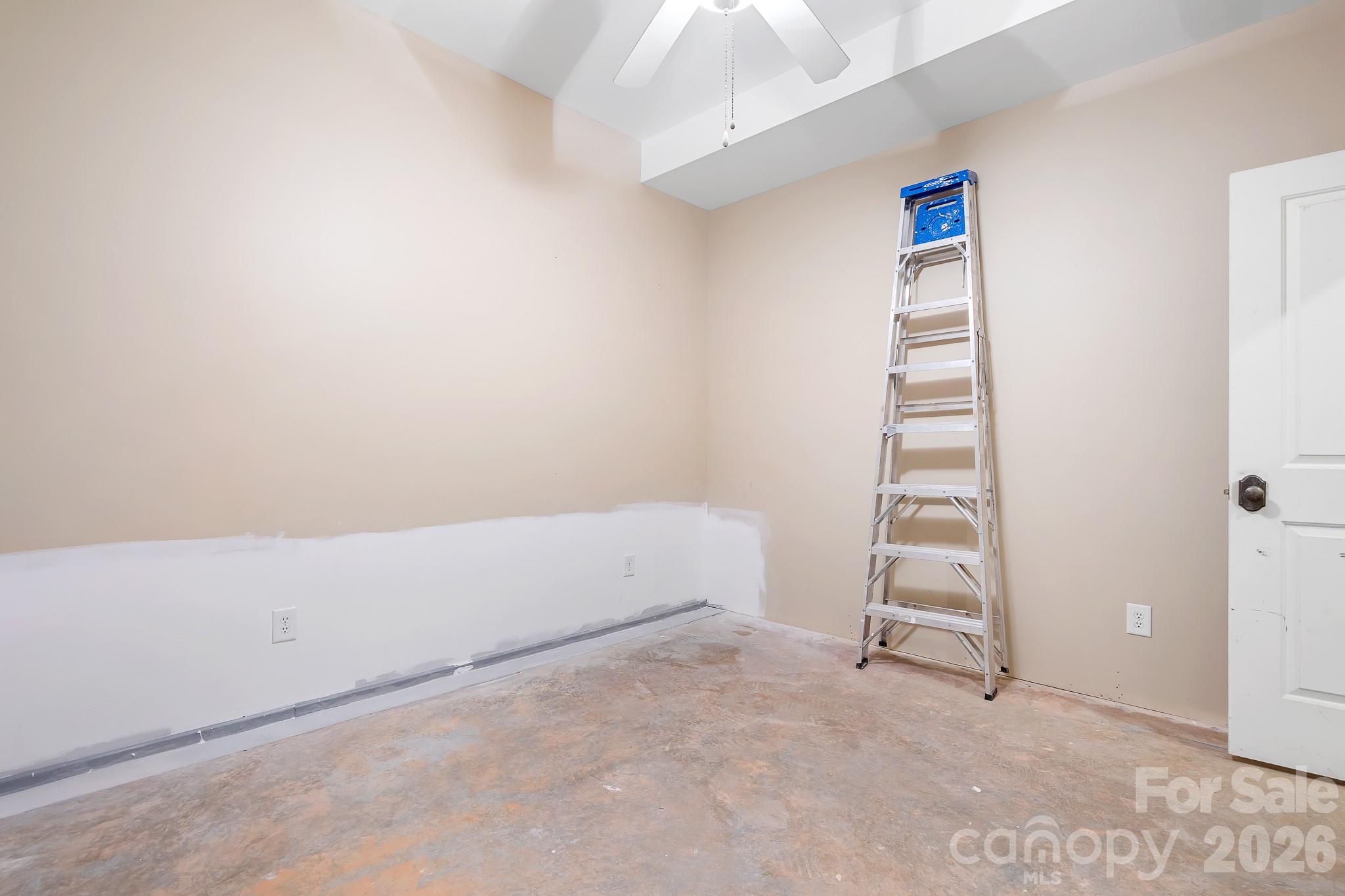 214 Lytham Lane Stanley, NC 28164 - Photo 30 of 46 a view of an empty room with stairs