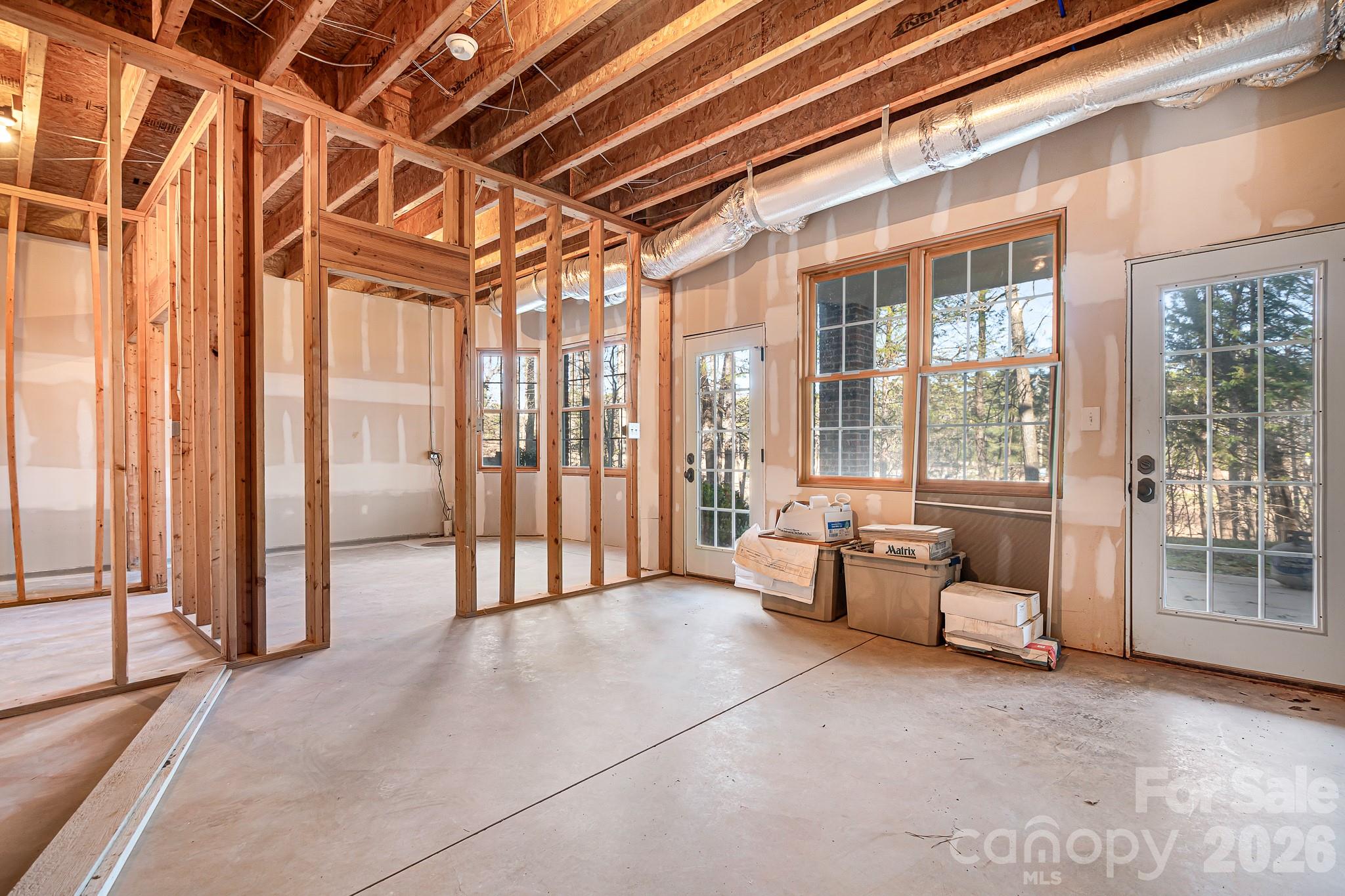 214 Lytham Lane Stanley, NC 28164 - Photo 33 of 46 a living room with furniture and large windows