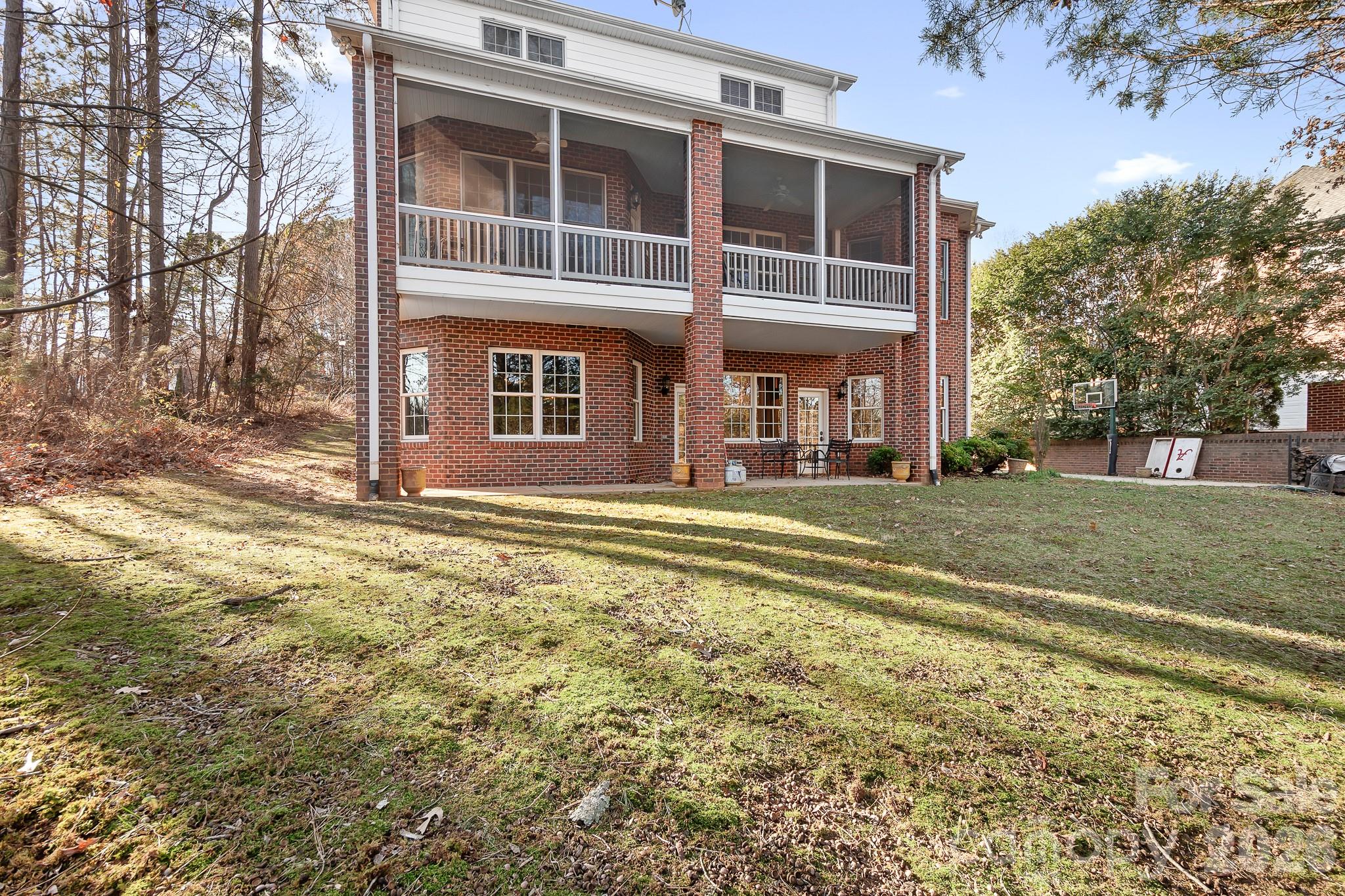 214 Lytham Lane Stanley, NC 28164 - Photo 36 of 46 a front view of residential houses with yard