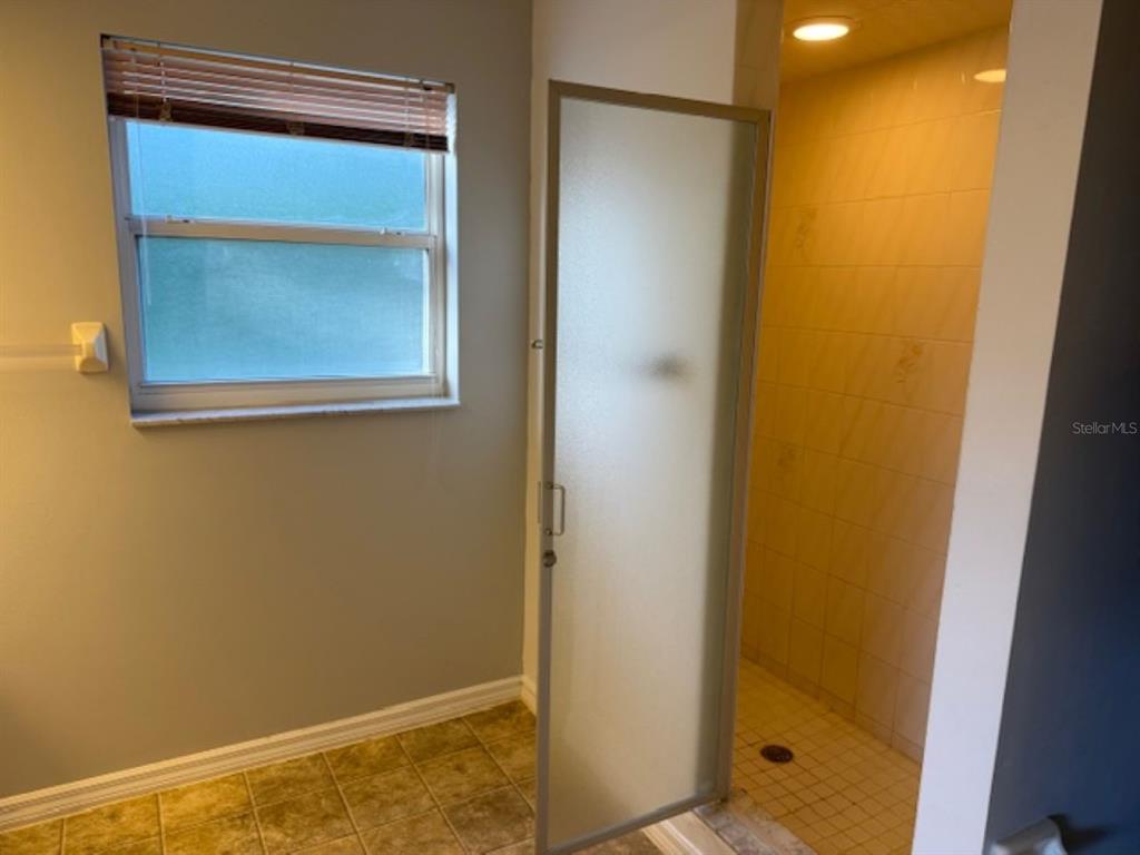 1335 East Silver Thorn Loop Hernando, FL 34442 - Photo 10 of 16 a bathroom with a shower