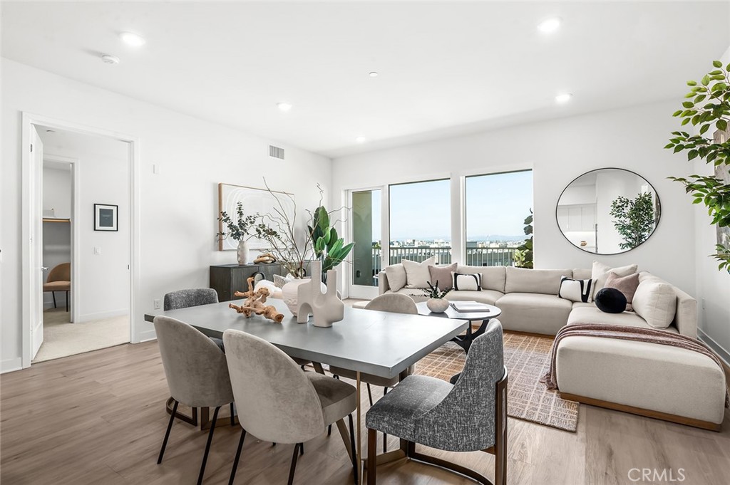 3604 Rivington Irvine, CA 92612 - Photo 5 of 54 a living room with furniture potted plant and a large window