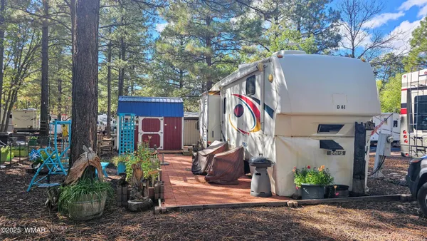 a view of a back yard of the house