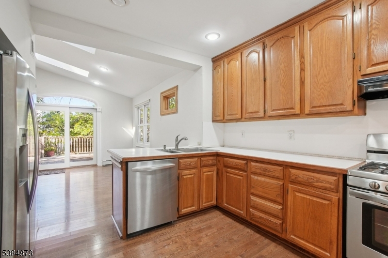 4 Fairwood Road Madison, NJ 07940 - Photo 16 of 38 a kitchen with sink cabinets and window