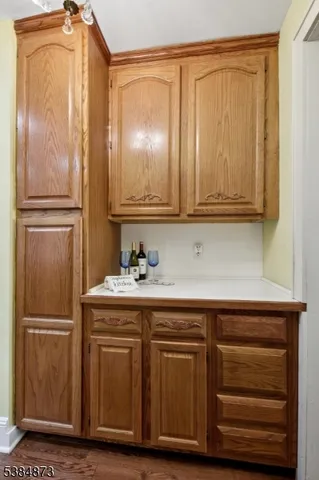 a kitchen with cabinets and stainless steel appliances