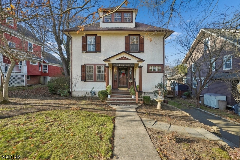 4 Fairwood Road Madison, NJ 07940 - Photo 2 of 38 a front view of a house with garden