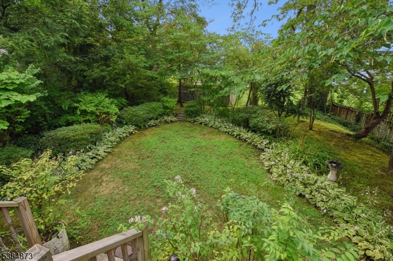 4 Fairwood Road Madison, NJ 07940 - Photo 32 of 38 a view of a yard with plants and large trees