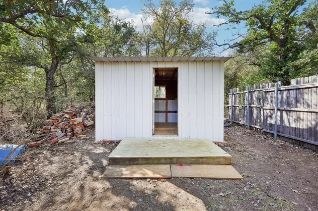 a view of backyard of house