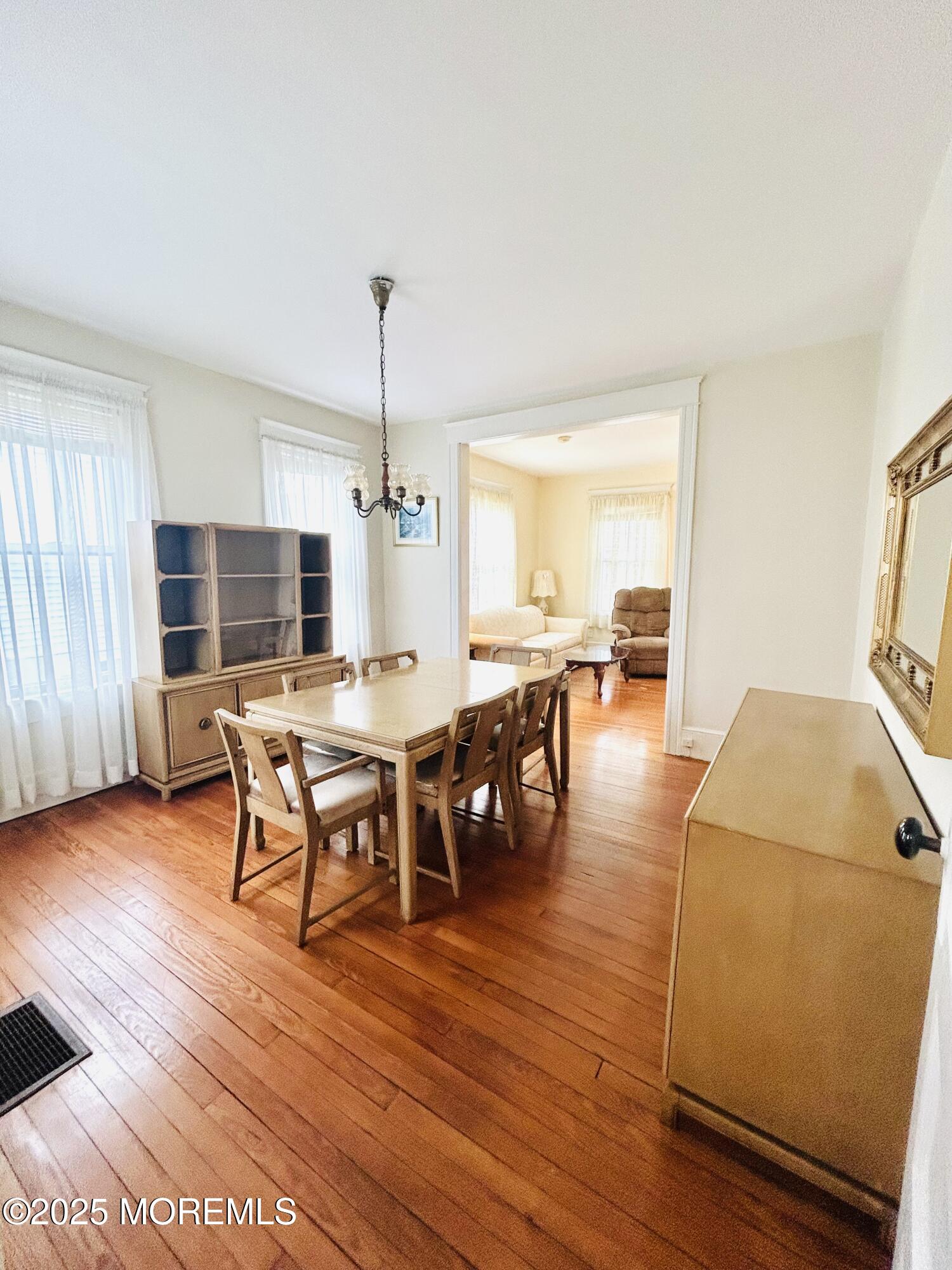 34 Rector Place Red Bank, NJ 07701 - Photo 32 of 34 a view of a dining room with furniture and wooden floor