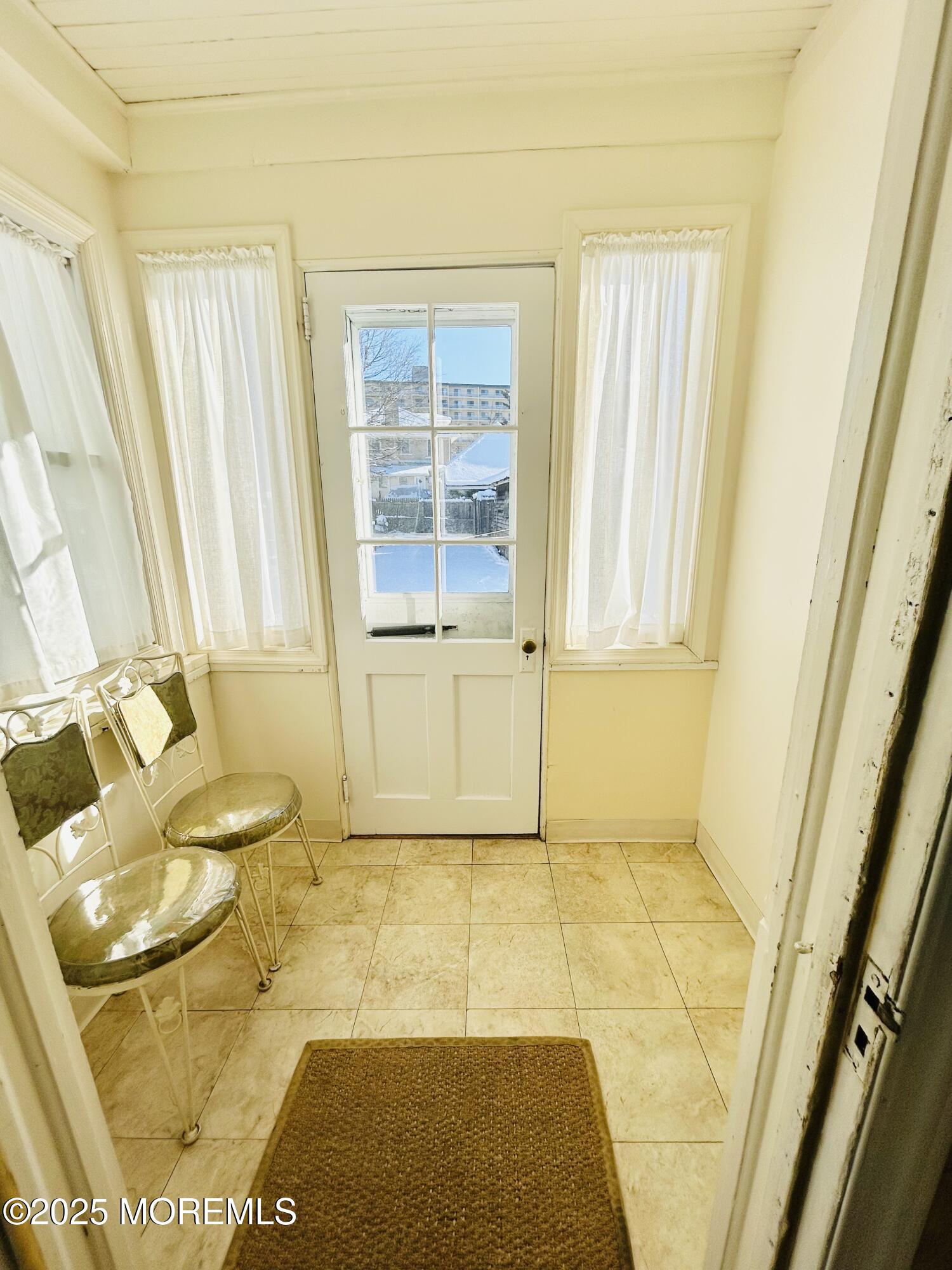 34 Rector Place Red Bank, NJ 07701 - Photo 34 of 34 a bathroom with a granite countertop sink and a mirror