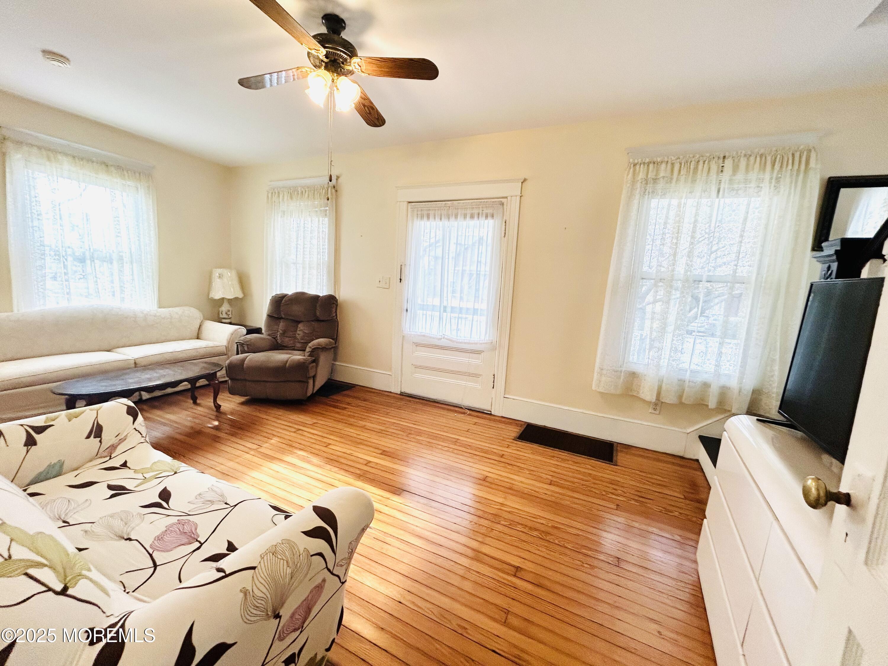 34 Rector Place Red Bank, NJ 07701 - Photo 4 of 34 a bedroom with furniture and a window
