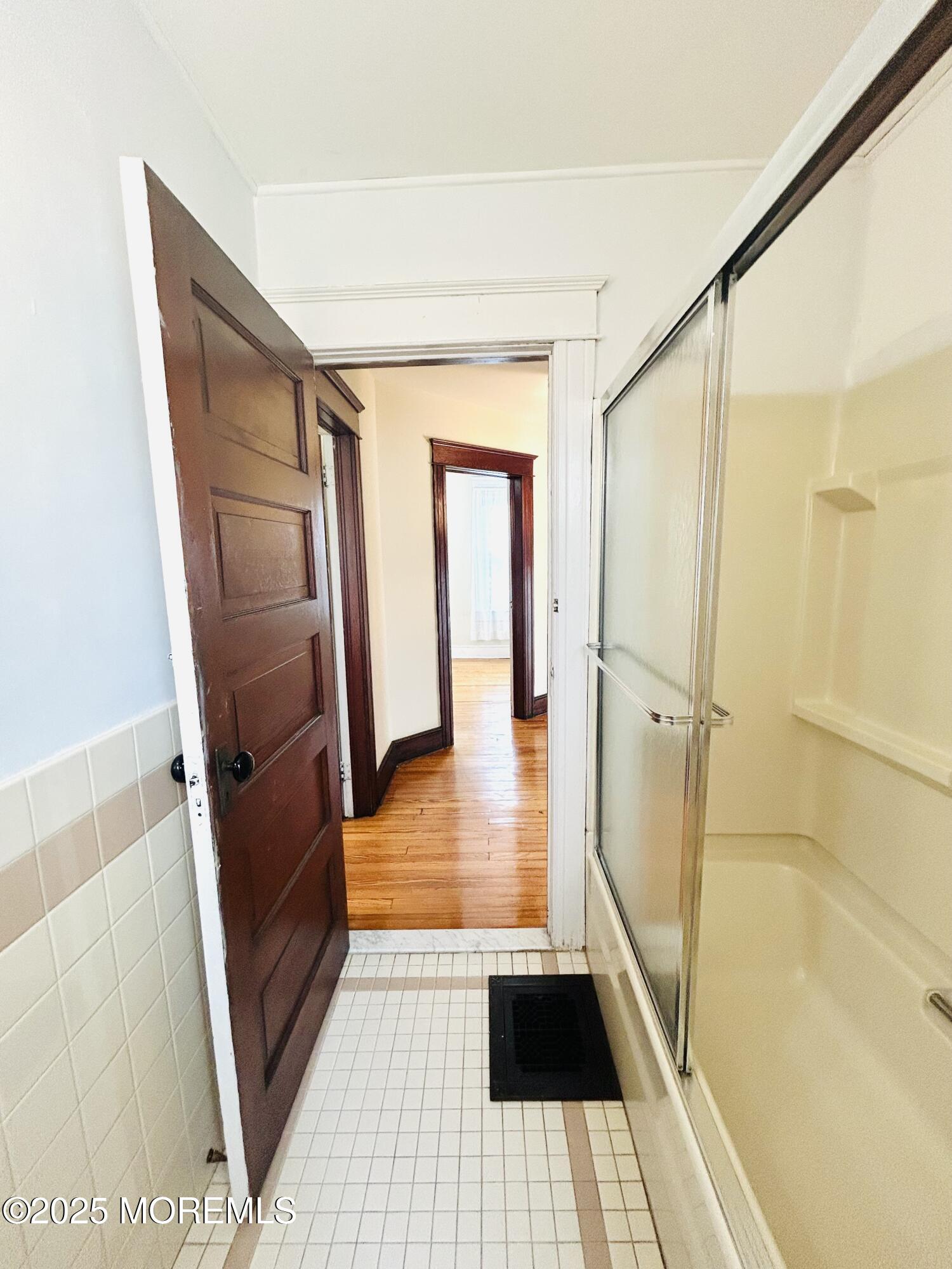 34 Rector Place Red Bank, NJ 07701 - Photo 5 of 34 a view of a hallway view with wooden floor and staircase