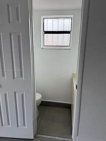 a bathroom with a toilet