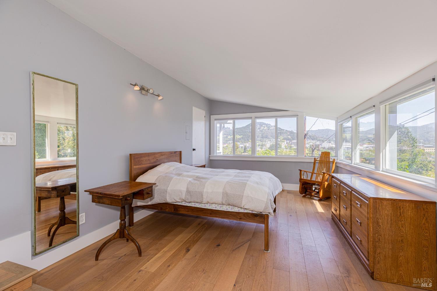 31 Martens Boulevard San Rafael, CA 94901 - Photo 12 of 50 a bedroom with a bed and a large window