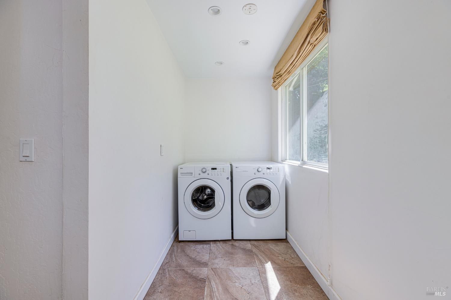 31 Martens Boulevard San Rafael, CA 94901 - Photo 18 of 50 a utility room with dryer and washer