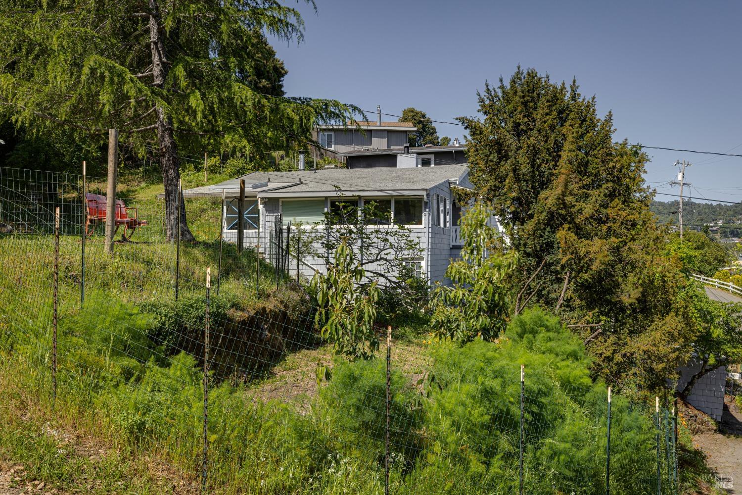 31 Martens Boulevard San Rafael, CA 94901 - Photo 29 of 50 a front view of a house with a garden