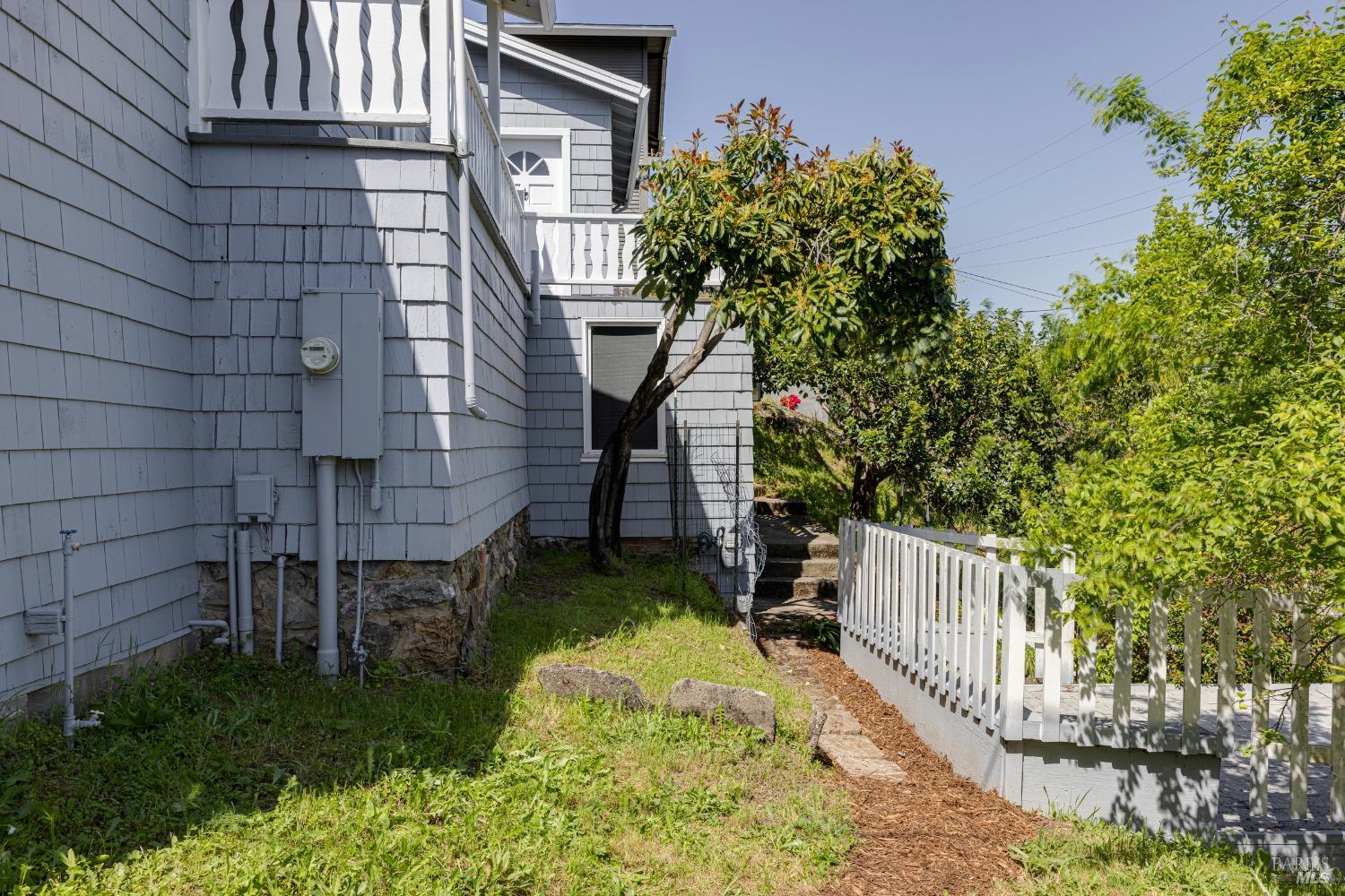 31 Martens Boulevard San Rafael, CA 94901 - Photo 34 of 50 a backyard of a house with lots of green space