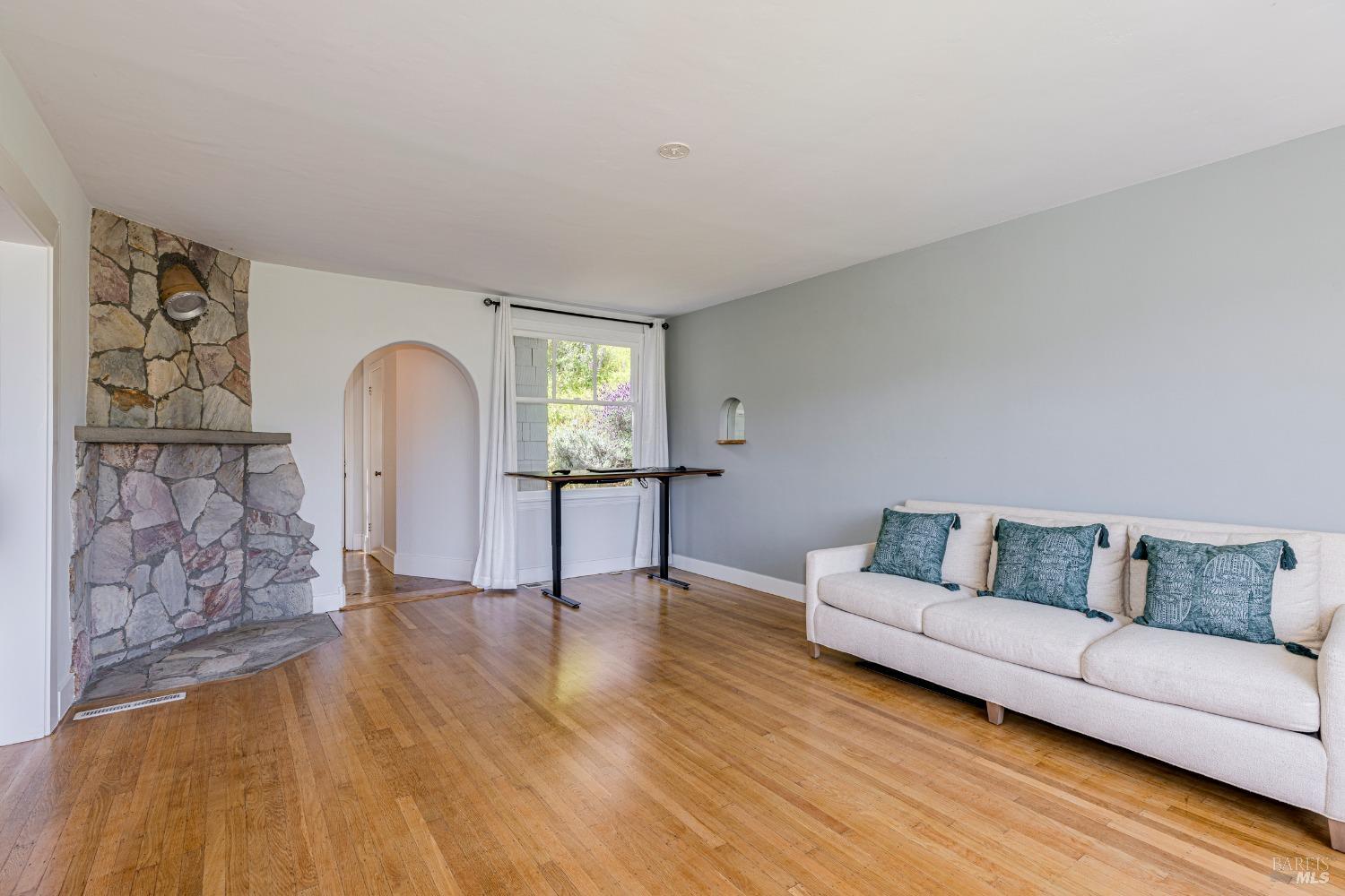 31 Martens Boulevard San Rafael, CA 94901 - Photo 5 of 50 a living room with furniture and a wooden floor