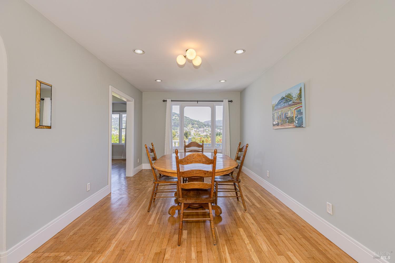 31 Martens Boulevard San Rafael, CA 94901 - Photo 10 of 50 a dining room with furniture and wooden floor