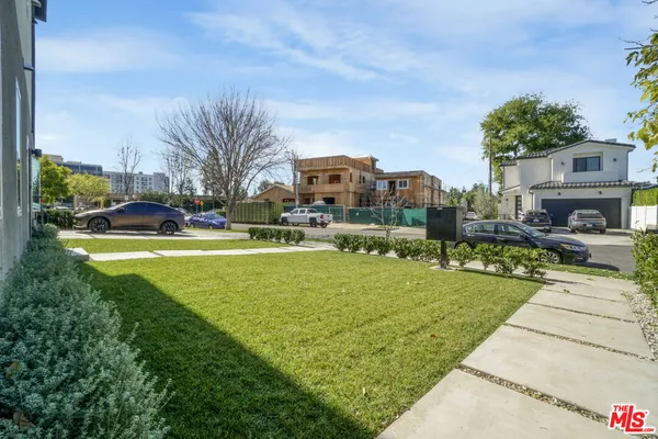 a car parked in front of a house