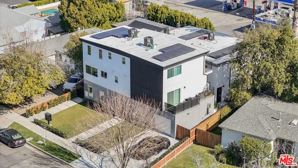 an aerial view of multiple house