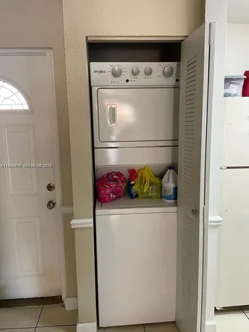 a utility room with washer and dryer
