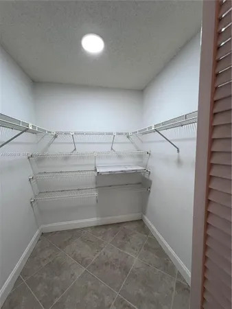 a storage room with cabinets