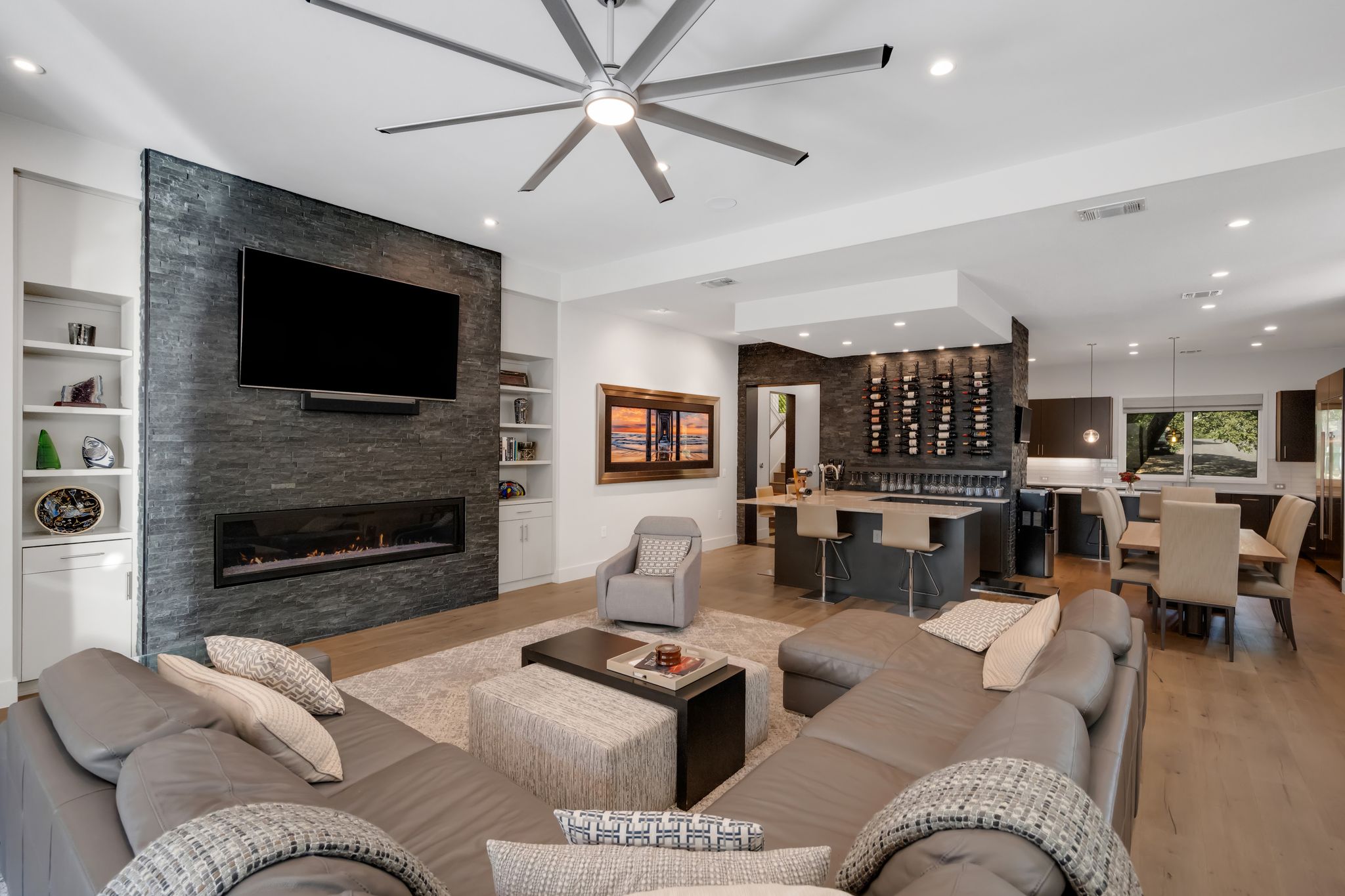 809 Bouldin Avenue Austin, TX 78704 - Photo 2 of 39 Living area featuring light wood finished floors, recessed lighting, a fireplace, built in features, and ceiling fan