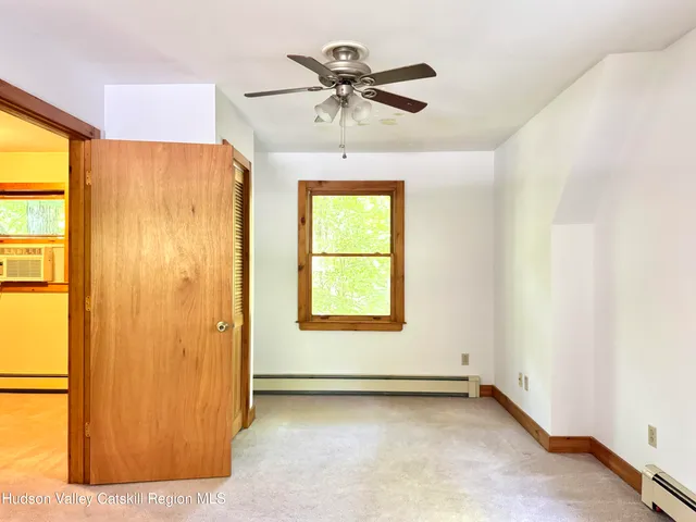 a view of a livingroom with a window