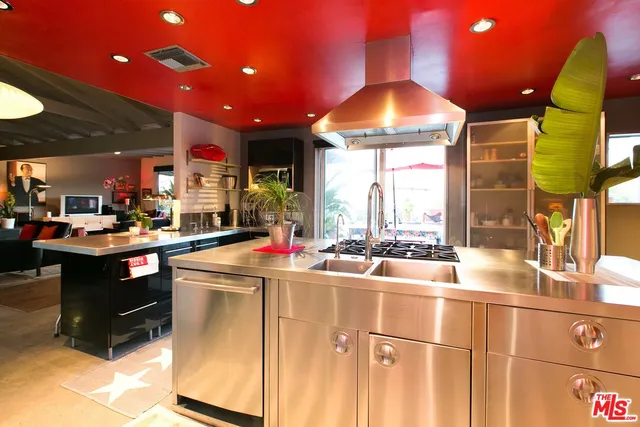 a kitchen with sink and window