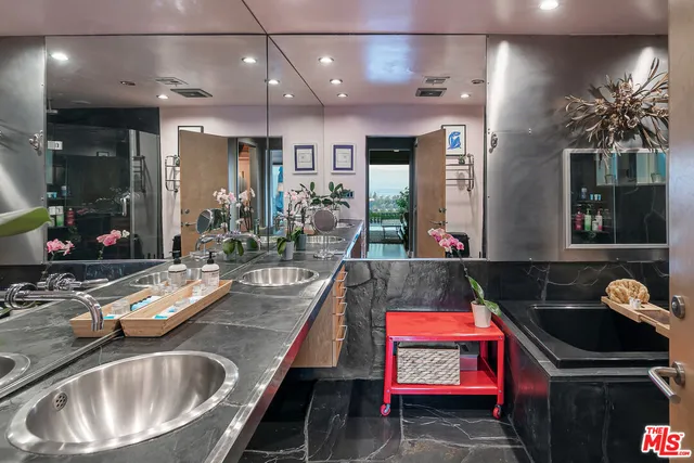 a kitchen with kitchen island granite countertop lots of counter top space