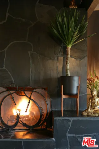a view of a livingroom with furniture and tub