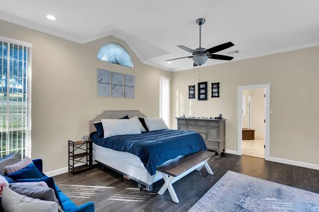 a bed room with a bed and a couch