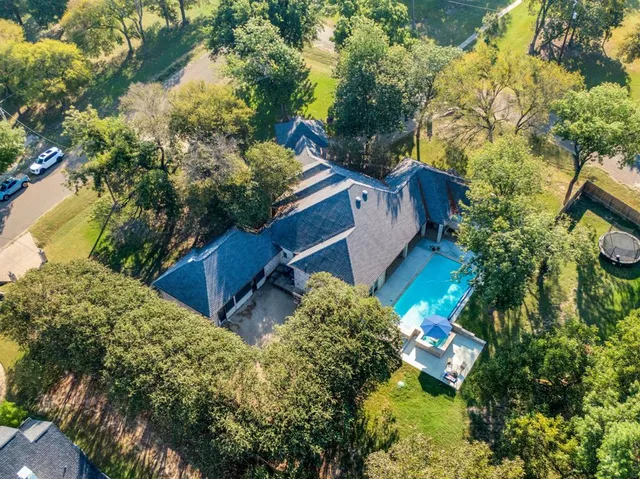a backyard of a house with lots of green space