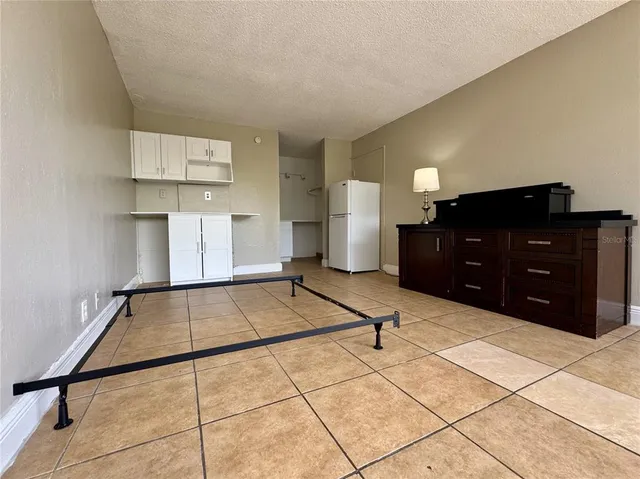 a room with gym equipment and appliances