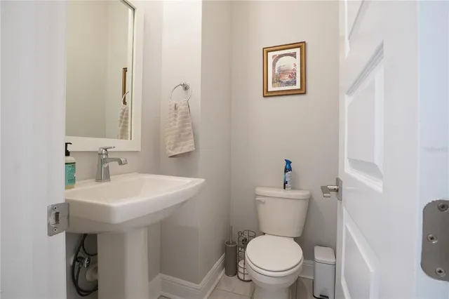 a bedroom with a bed and with furniture