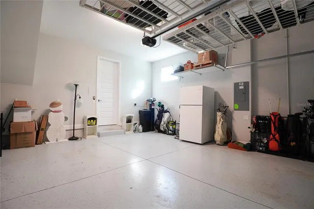 a room with gym equipment and a large mirror