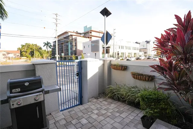 a city view with tall buildings and a street view
