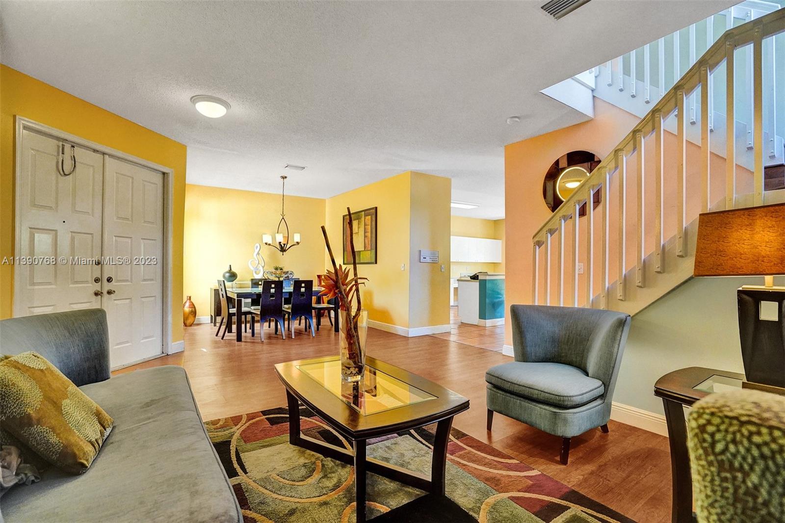 Silver Shores Miramar, FL 33027 - Photo 21 of 30 a living room with furniture and wooden floor