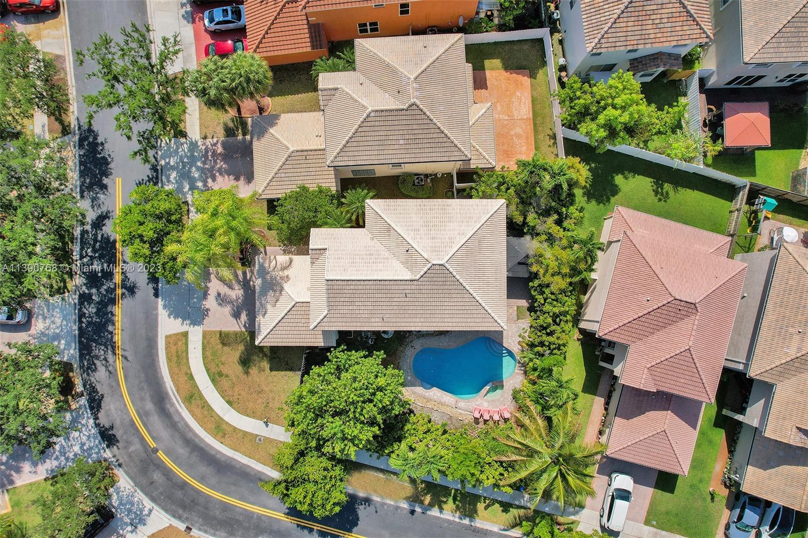 Silver Shores Miramar, FL 33027 - Photo 4 of 30 an aerial view of a house with swimming pool
