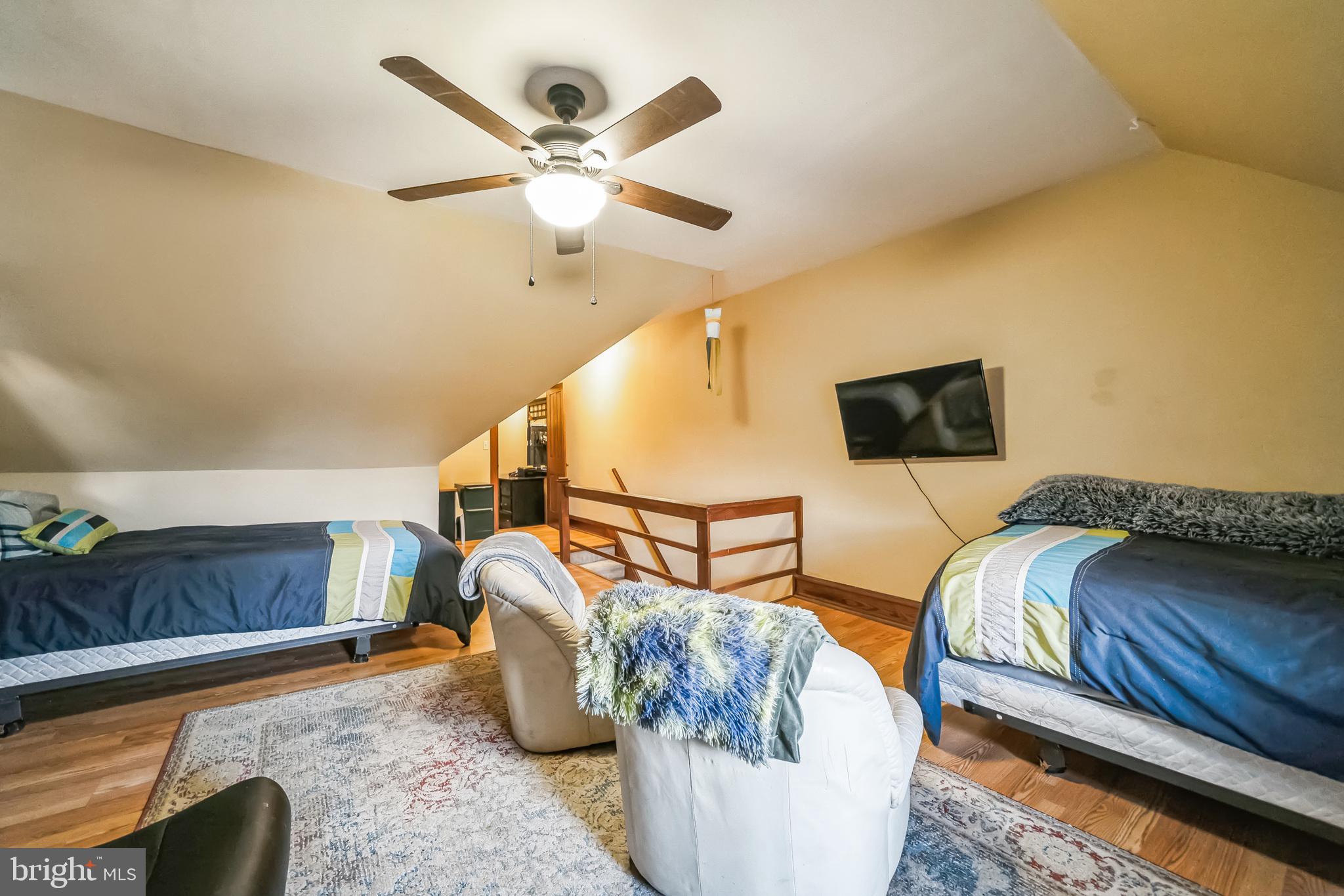 59 Cherry Street Hatfield, PA 19440 - Photo 24 of 30 a living room with furniture and a flat screen tv