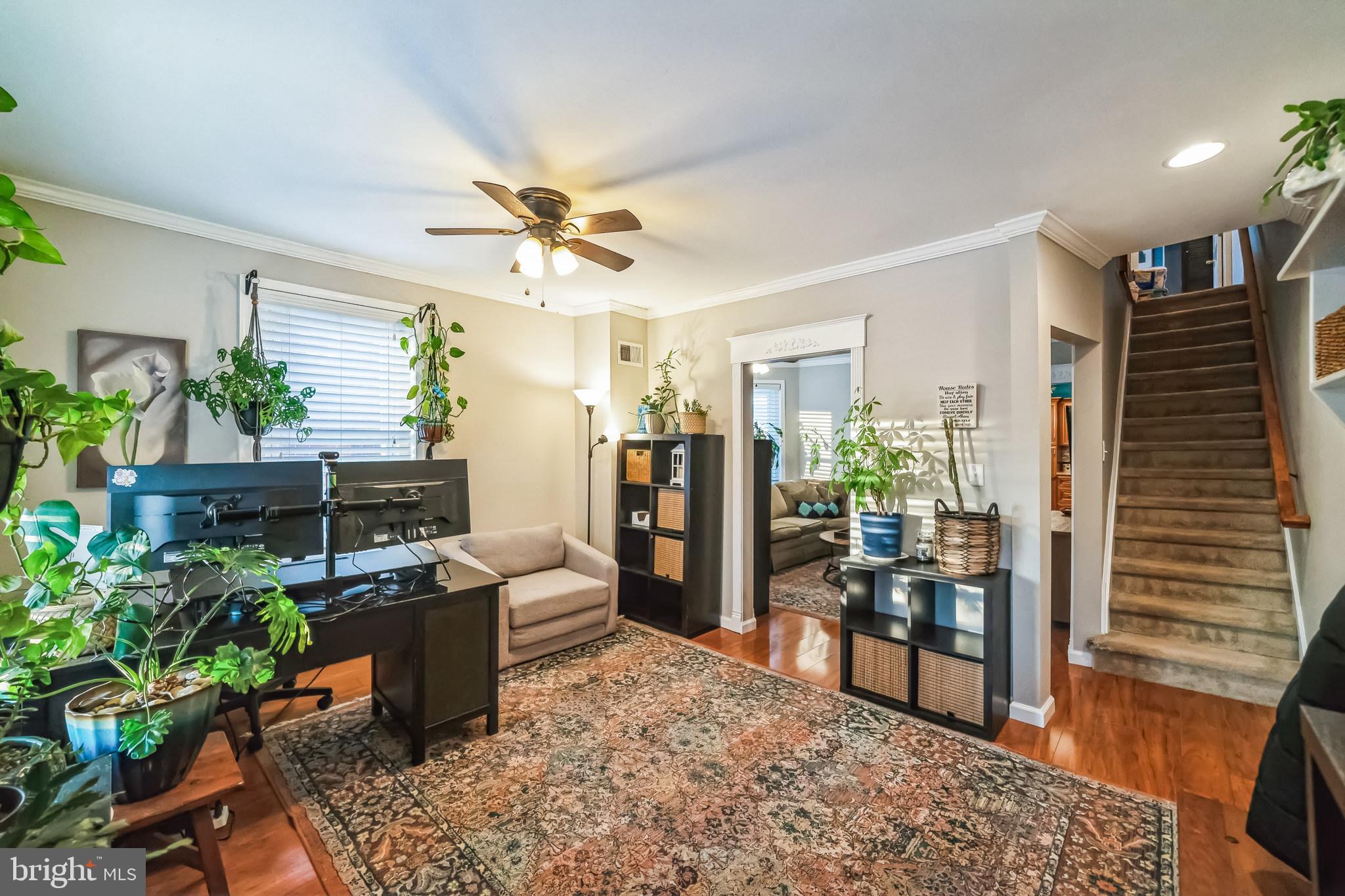 59 Cherry Street Hatfield, PA 19440 - Photo 3 of 30 a living room with furniture and a potted plant