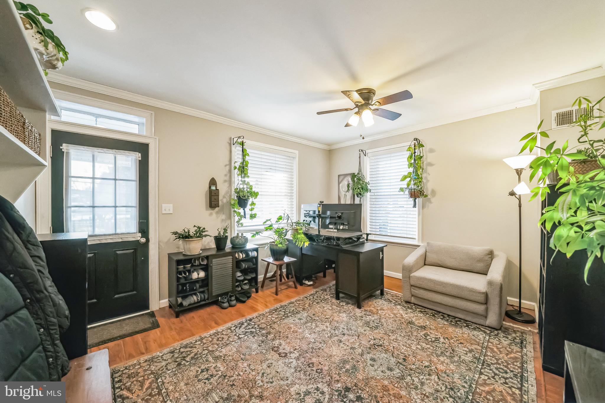 59 Cherry Street Hatfield, PA 19440 - Photo 10 of 30 a living room with furniture a chandelier and a rug