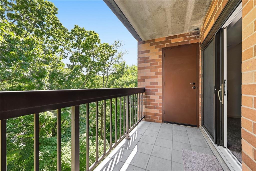 1500 Cochran Road, Unit 900 Pittsburgh, PA 15243 - Photo 28 of 32 Balcony off Primary Bedroom