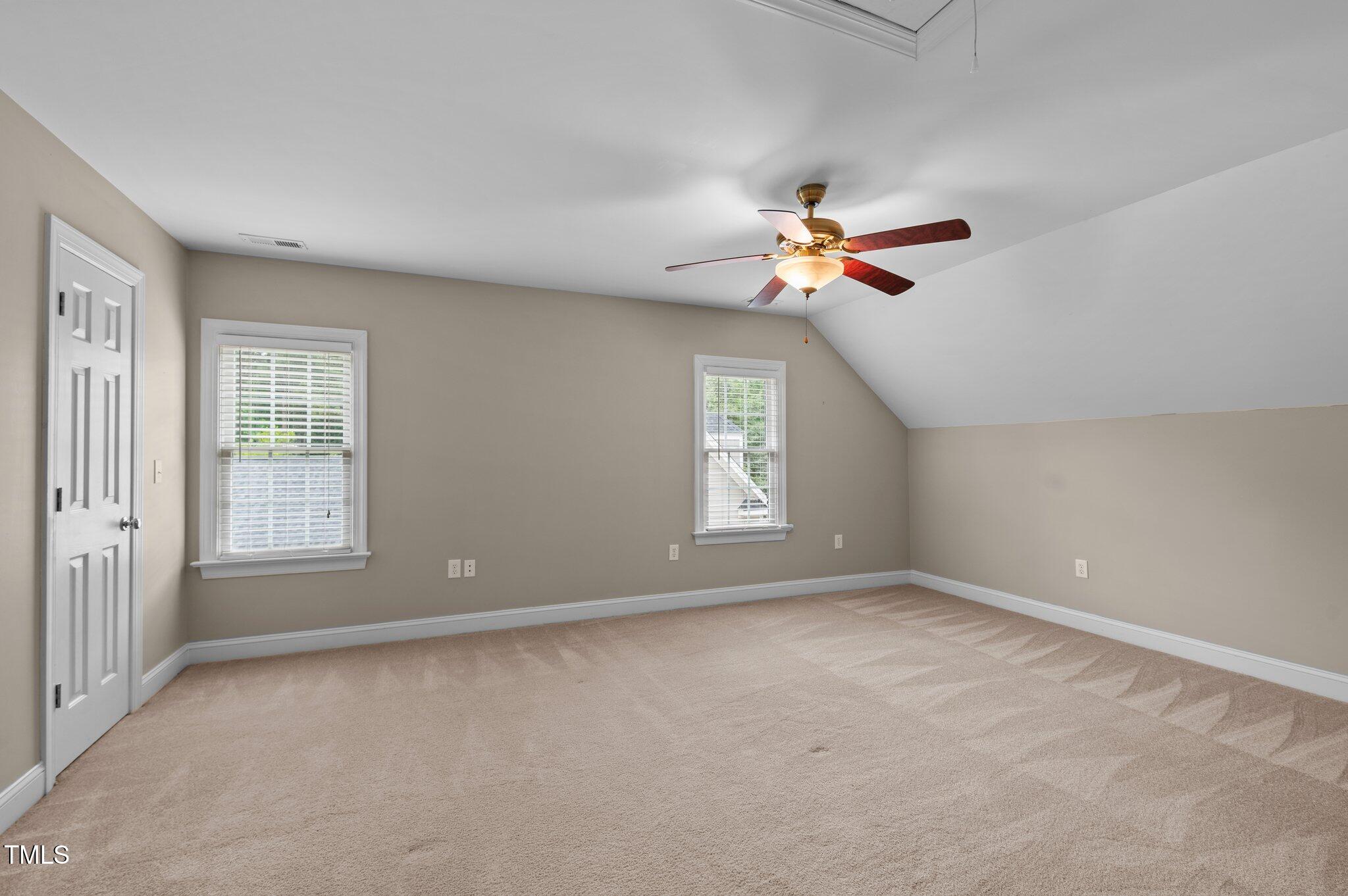 1012 Coram Fields Road Wake Forest, NC 27587 - Photo 24 of 38 a view of an empty room with a window