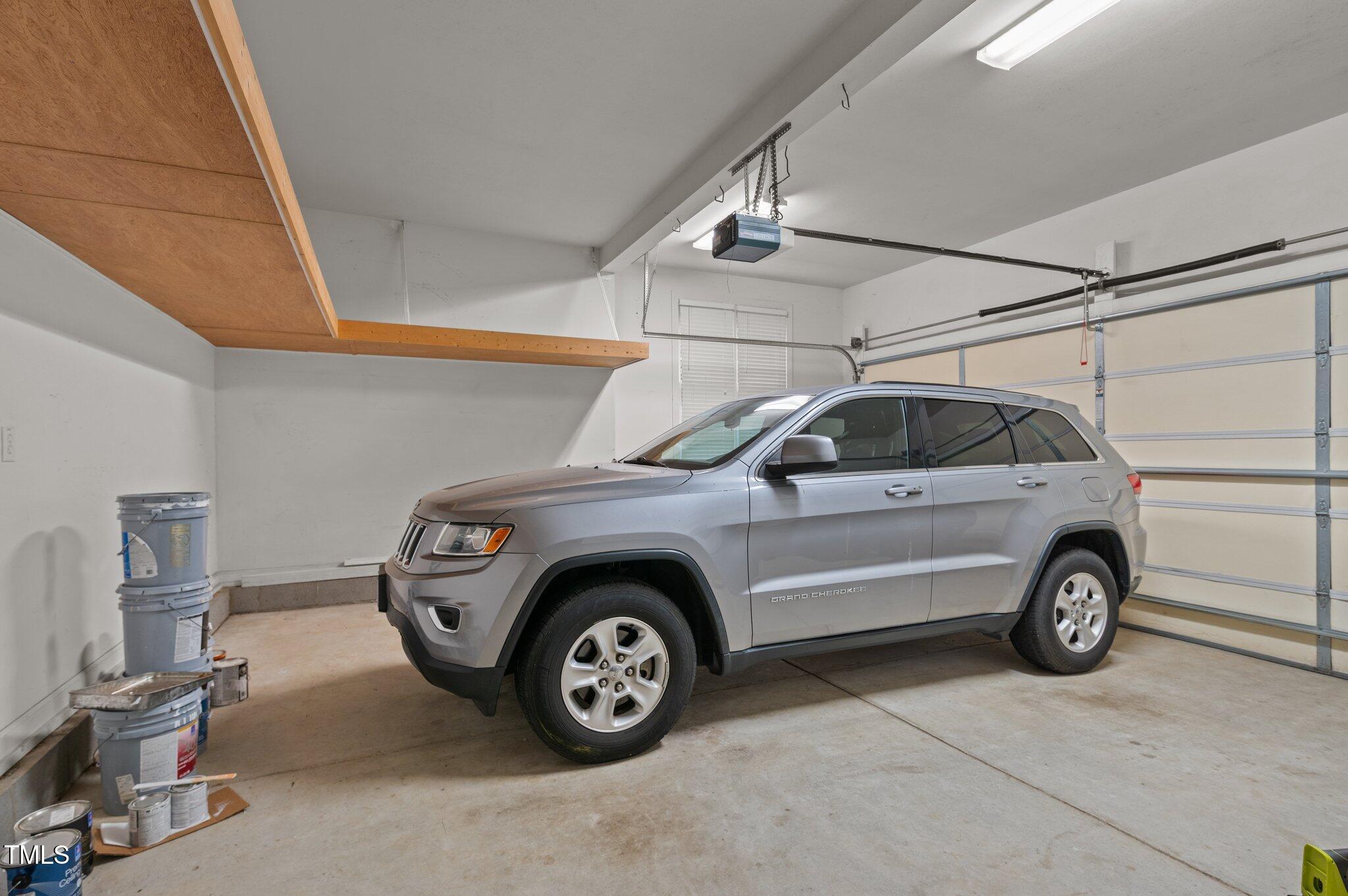 1012 Coram Fields Road Wake Forest, NC 27587 - Photo 31 of 38 a view of a car in a garage