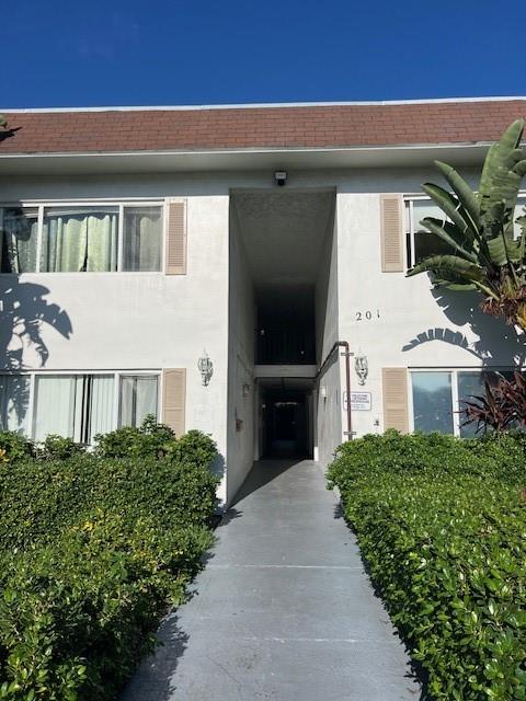 a house view with a garden space