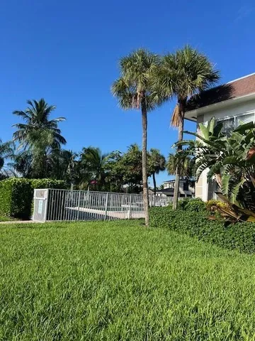 a house view with a garden space