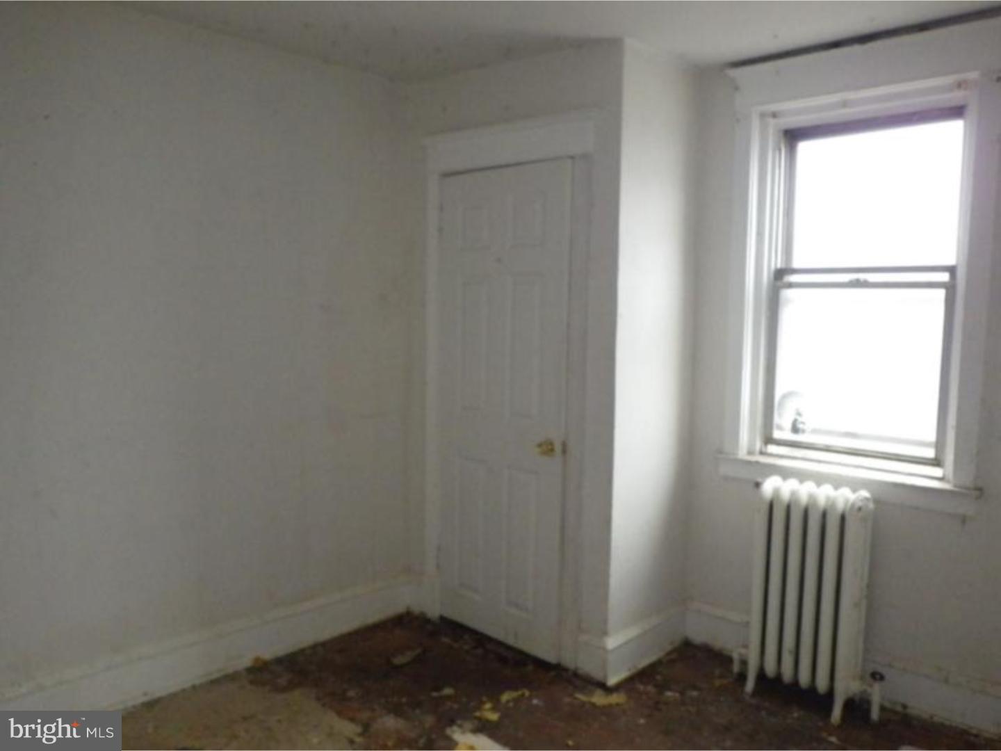 634 Littlecroft Road Upper Darby, PA 19082 - Photo 6 of 9 an empty room with a window