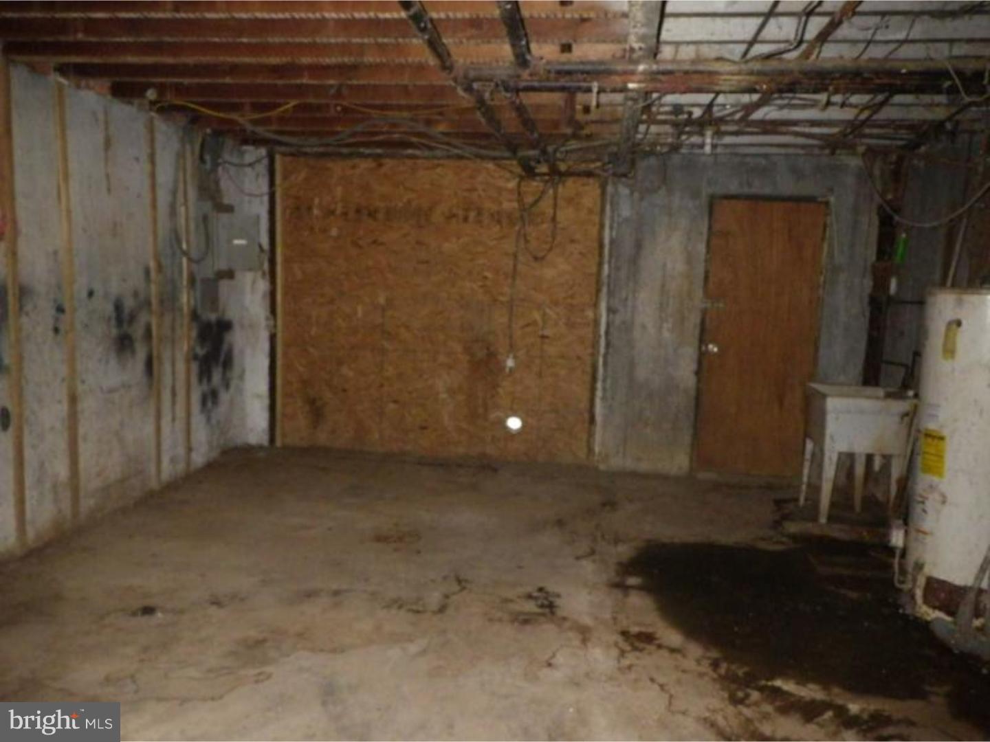 634 Littlecroft Road Upper Darby, PA 19082 - Photo 8 of 9 a view of a room with wooden walls