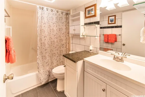 a bathroom with a sink and a shower